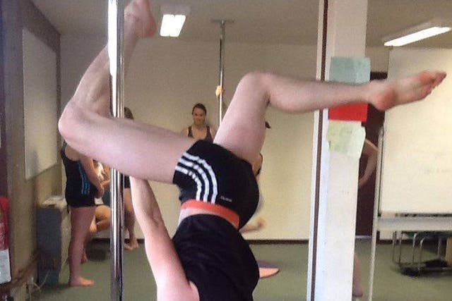 Will Shillibier ably demonstrates that pole fitness is not just for women