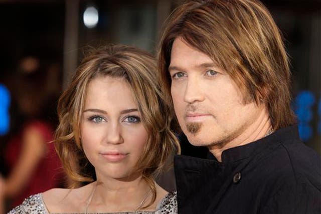 Miley Cyrus with her father, country musician Billy Ray Cyrus