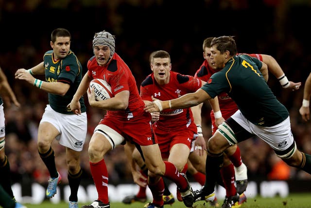Wales centre Jonathan Davies, second left, is set to miss the Six Nations