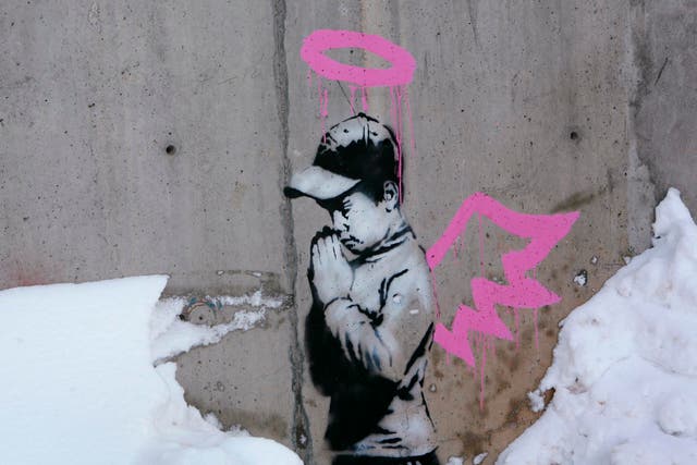 This artwork by Banksy was found covered in brown paint earlier this week