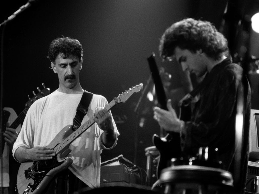 Stringing along: Frank Zappa with his son Dweezil in 1985