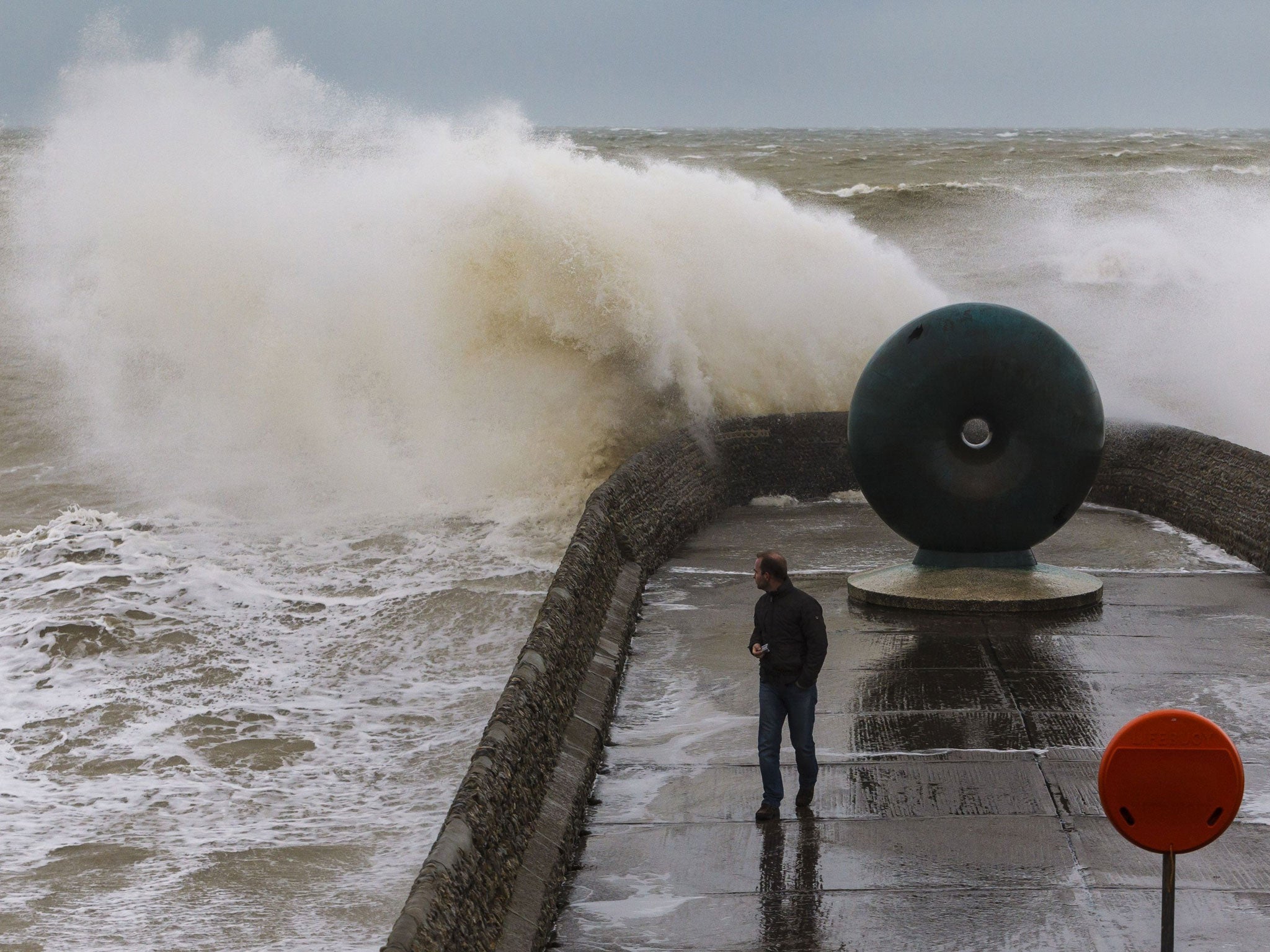 Waves hit the seafront at Brighton