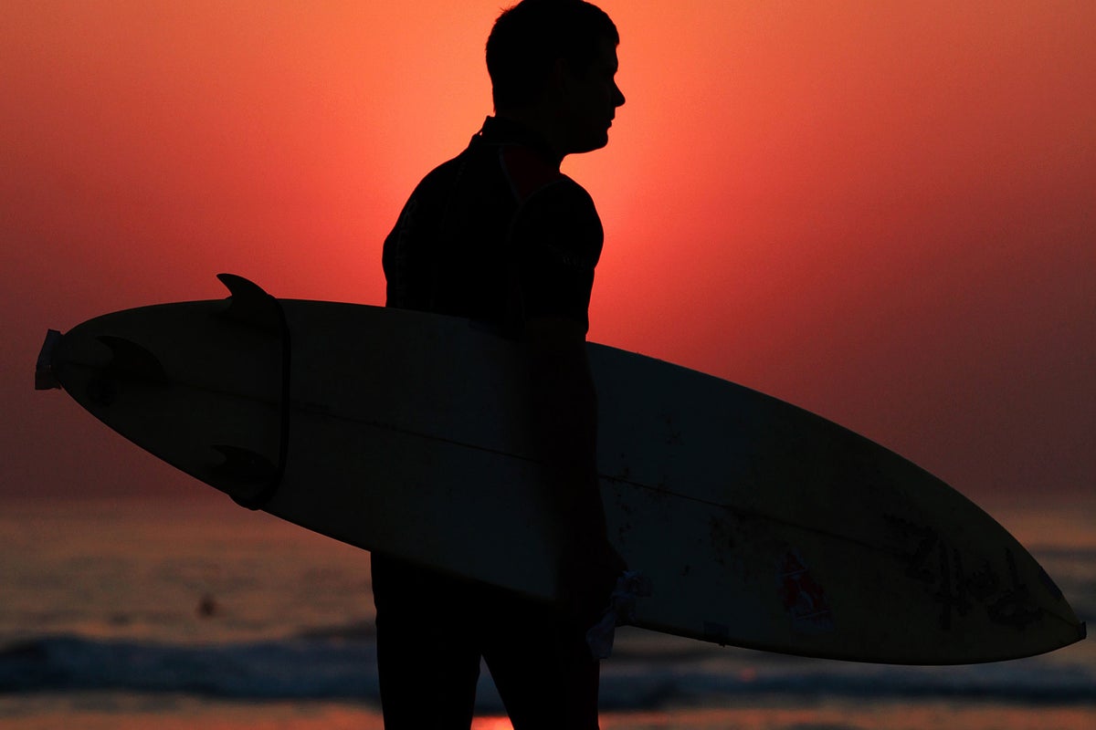 Japanese surfer rescued after spending 16 hours adrift in the ocean off ...