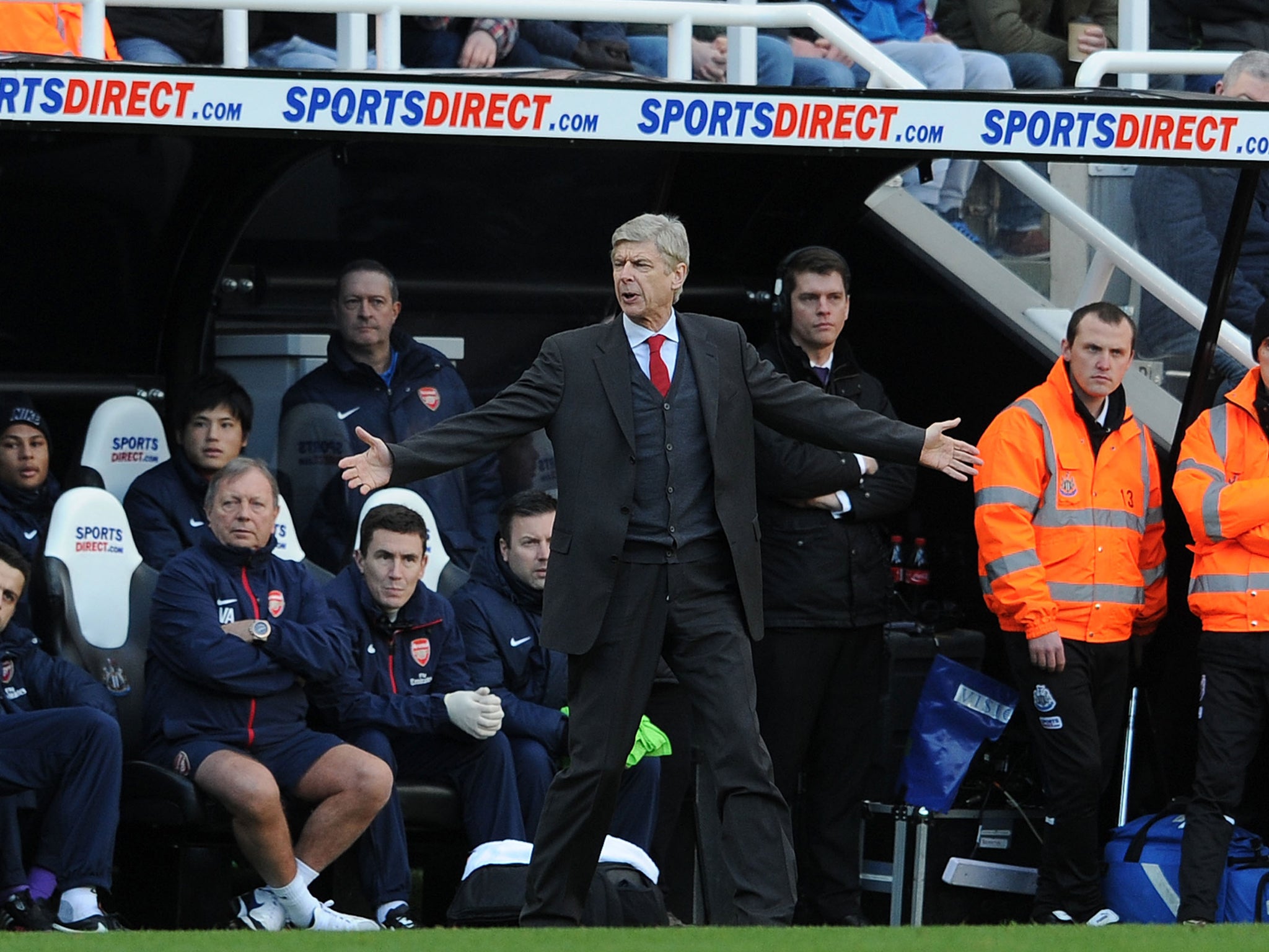 Arsene Wenger gestures on the sidelines during Arsenal's win over Newcastle