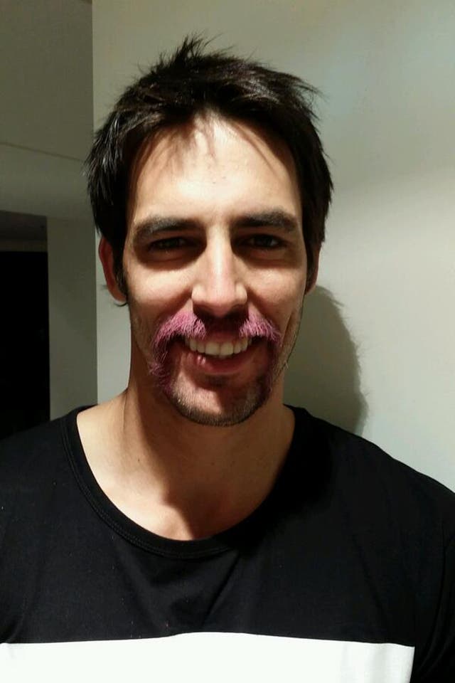Mitchell Johnson has died his moustache pink for charity ahead of the third day of the fifth and final Ashes Test
