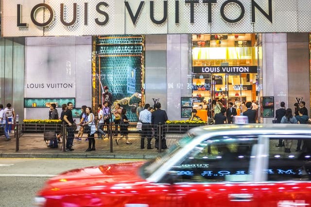 Attention to retail: Shoppers outside Louis Vuitton on Canton Road