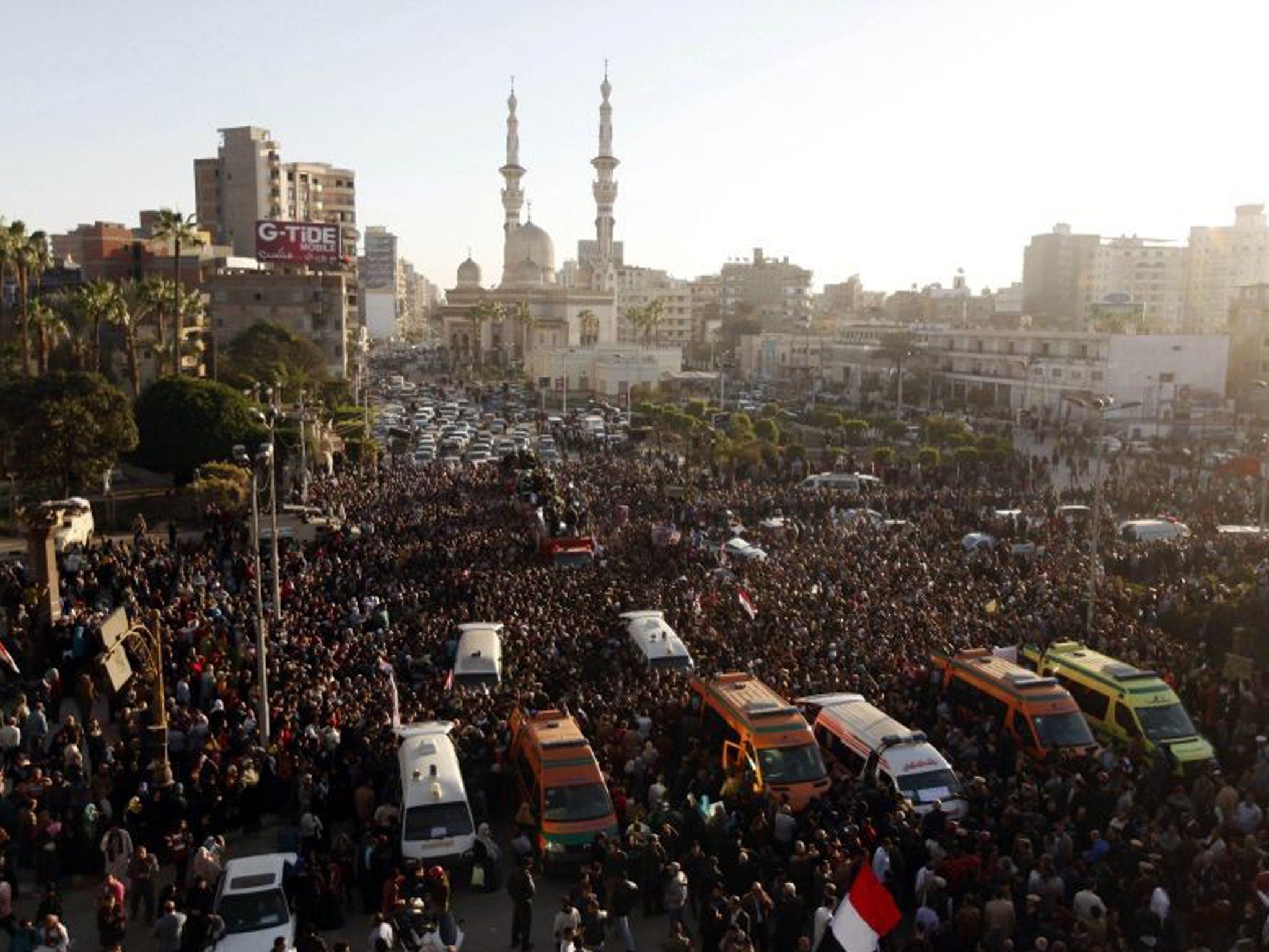 Hundreds of mourners gathered to protest at the funeral service for the people killed on 24 December in Mansoura