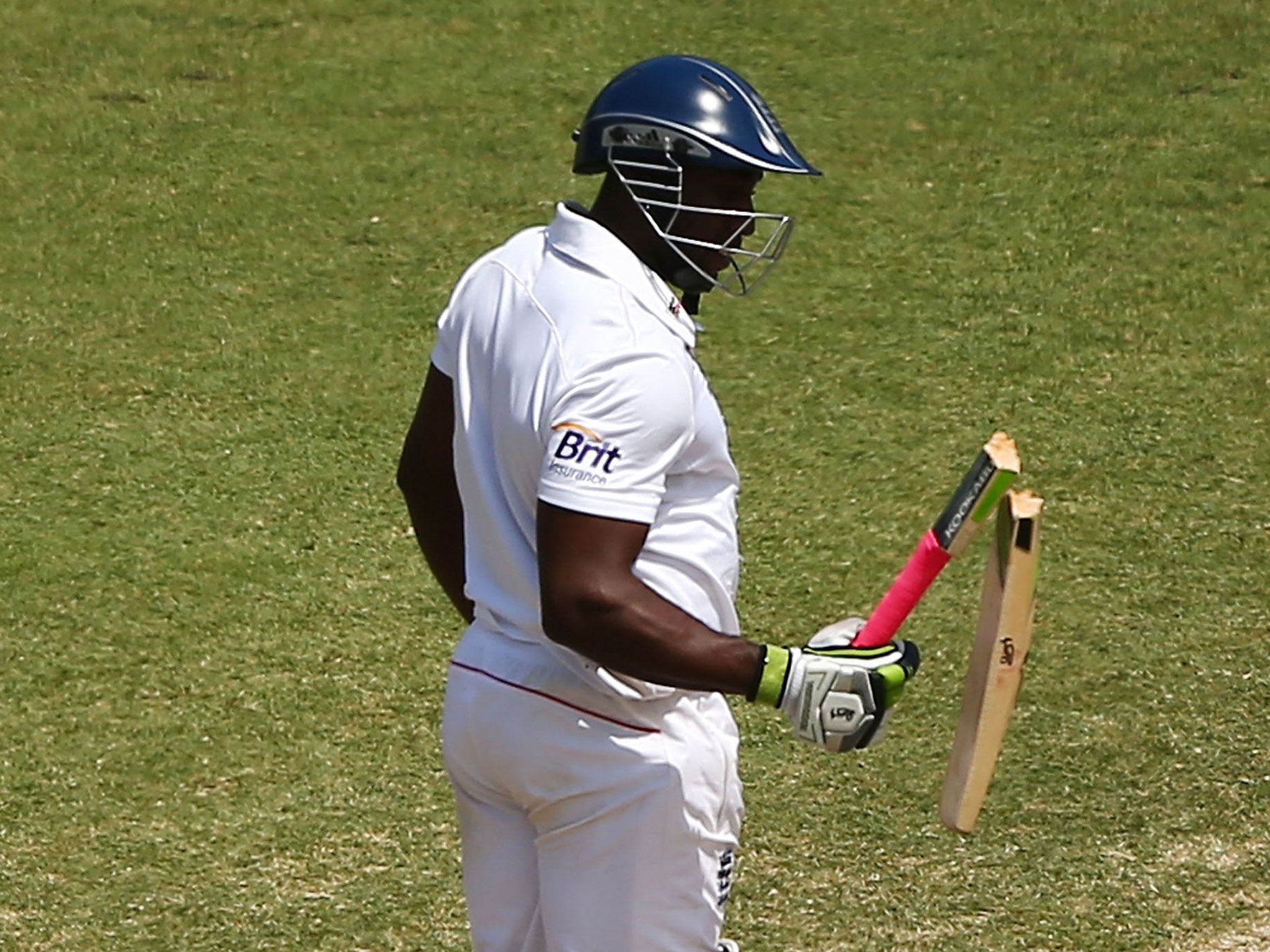 Michael Carberry has his bat broken by a delivery from Ryan Harris during day three of the Fifth Ashes Test