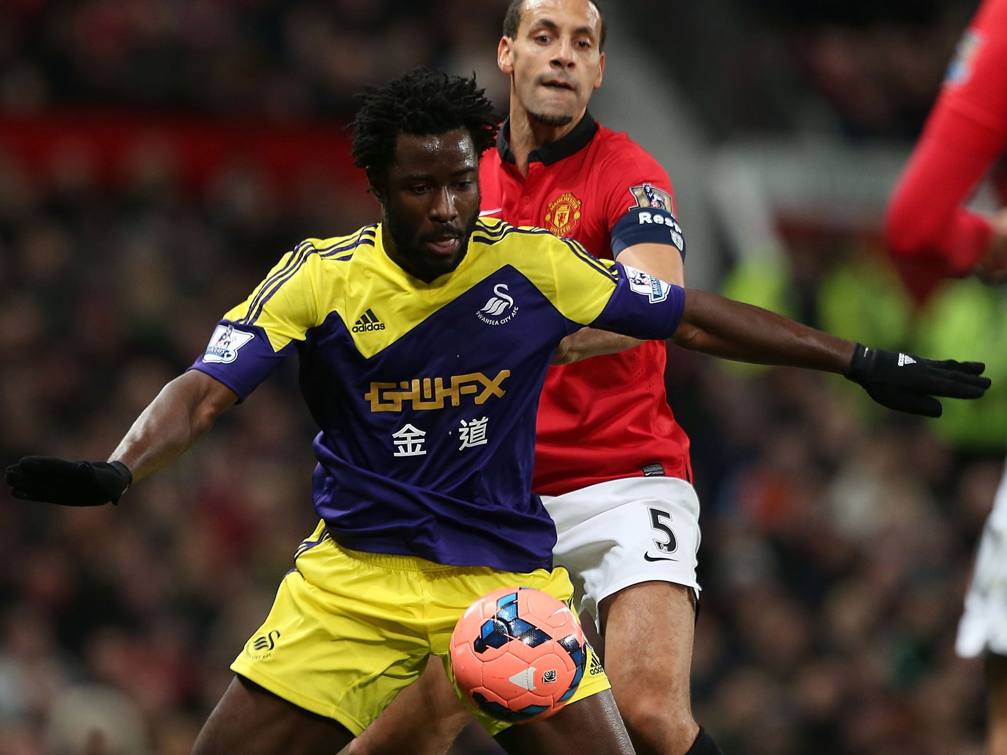 Wilfried Bony holds off Rio Ferdinand in Swansea's 2-1 win at Manchester United in the FA Cup