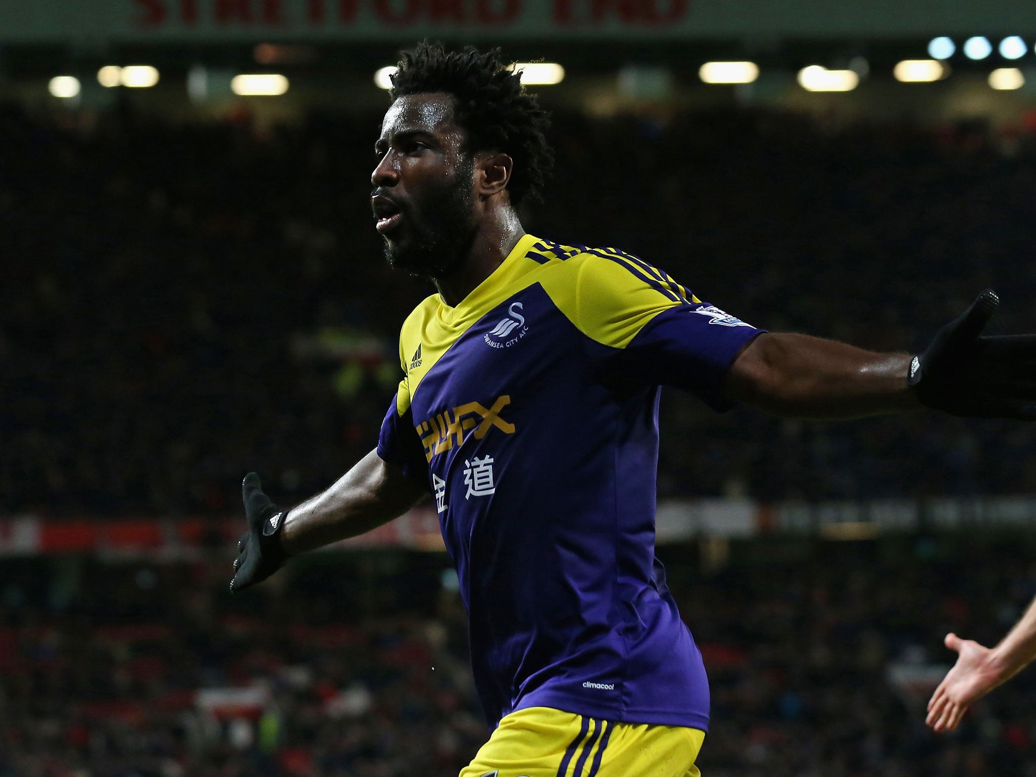 Wilfried Bony celebrates his late header at Old Trafford