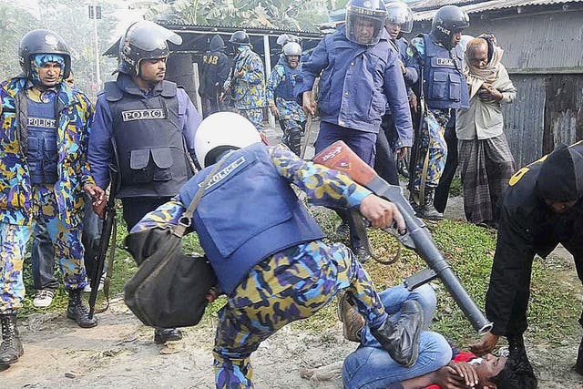A clash between police and protesters after a crowd attacked polling booths in Bogra in the north
