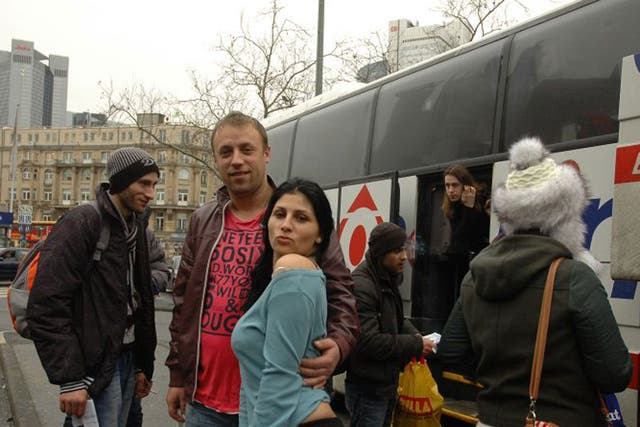 Vali Draghici, (centre, red t-shirt) 40, from Buz?u, who was getting off at Frankfurt to work in steel welding and construction. He was one of many builders who befriended Alexandra 'Pamela' Benitez-Pozo, 32, who was going to Cologne where she works as a 