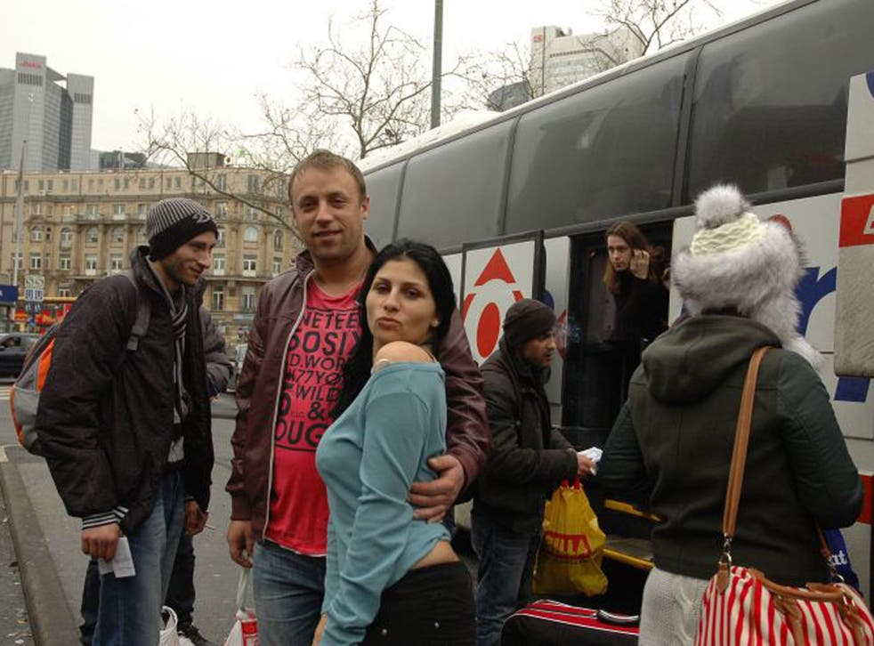 Vali Draghici, centre in the red t-shirt, 40, from Buzău, who was getting off at Frankfurt to work in steel welding and construction. He was one of many builders who befriended Alexandra 'Pamela' Benitez-Pozo, 32, who was going to Cologne where she works 