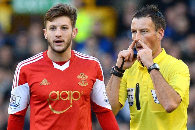 Mark Clattenburg, right, and Adam Lallana, left, the men at the centre of a farcical controversy