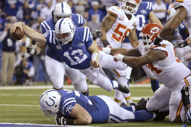 Indianapolis Colts quarterback Andrew Luck (12) dives for a touchdown