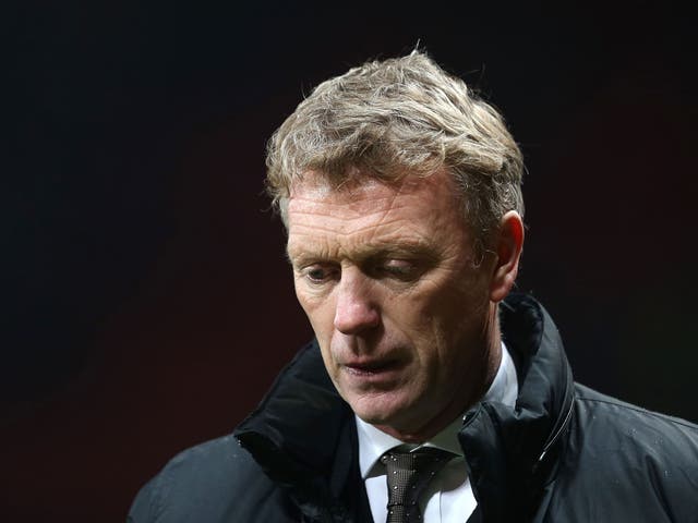 David Moyes appears dejected with he defeat to Swansea in the FA Cup third round