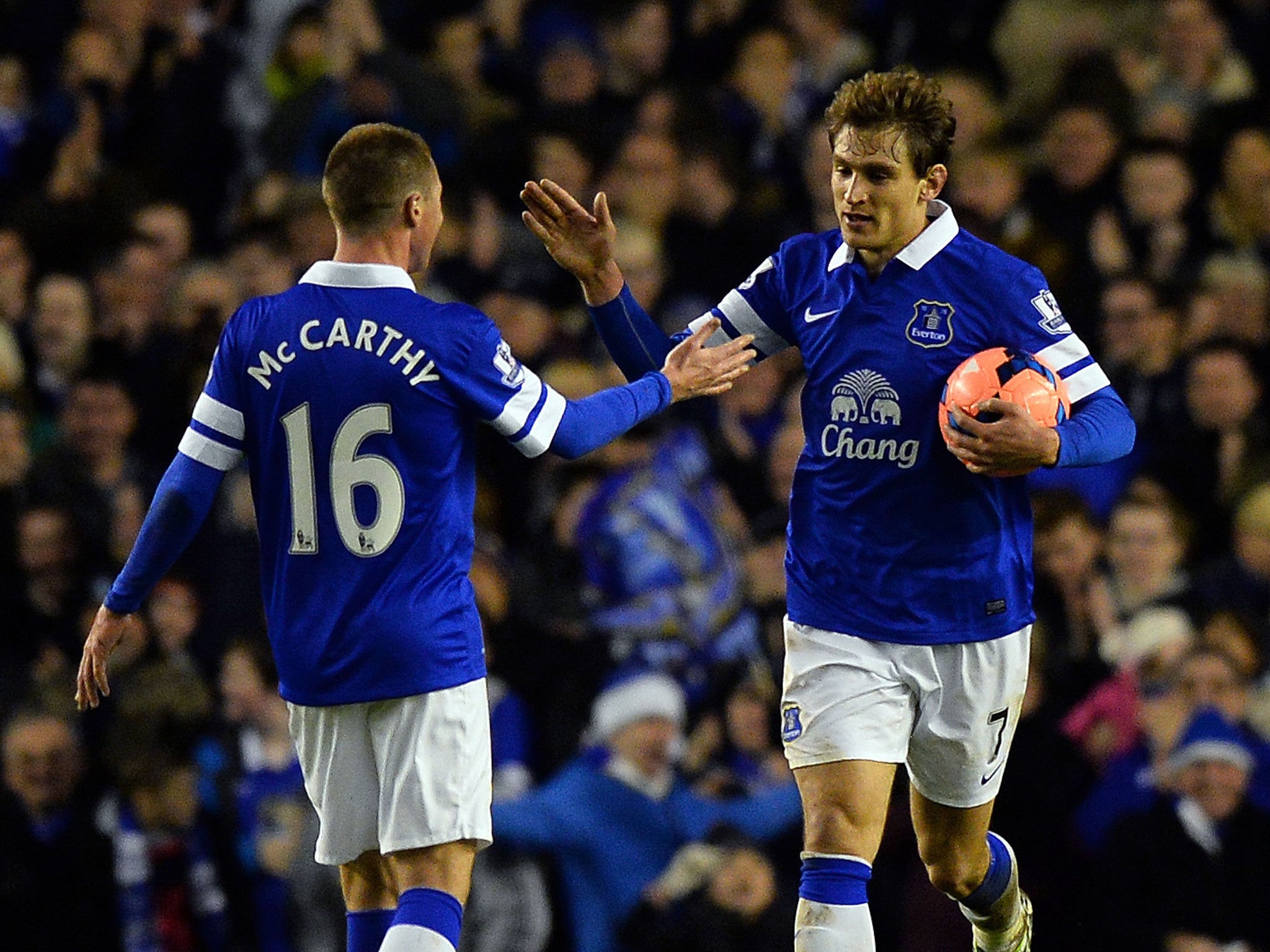 Everton striker Nikica Jelavic celebrates with James McCarthy after scoring in the 4-0 FA Cup win over QPR