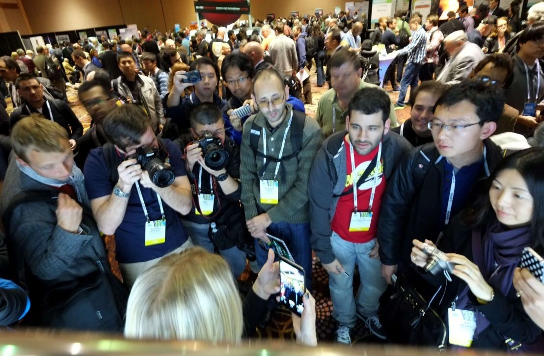 Journalists watch presentation of LG G Flex phone during the first press event 'CES Unveiled' at the Mandalay Bay Convention Center prior to the 2014 International CES in Las Vegas, Nevada on January 05, 2014.