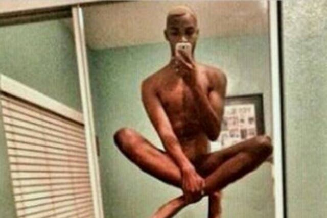 A man competes in the Selfie Olympics 