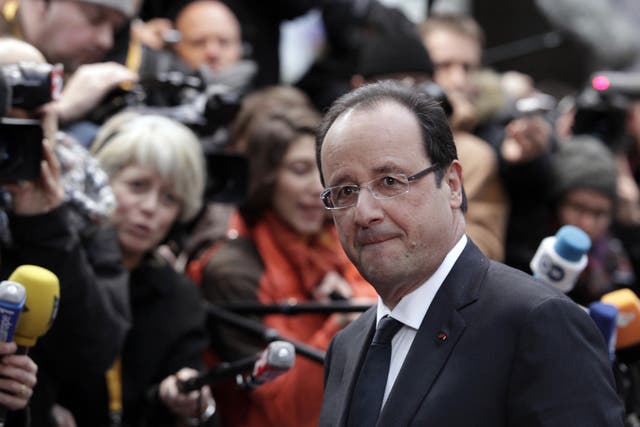 Mr Hollande is accused of abandoning his 'anti-finance' election promises
