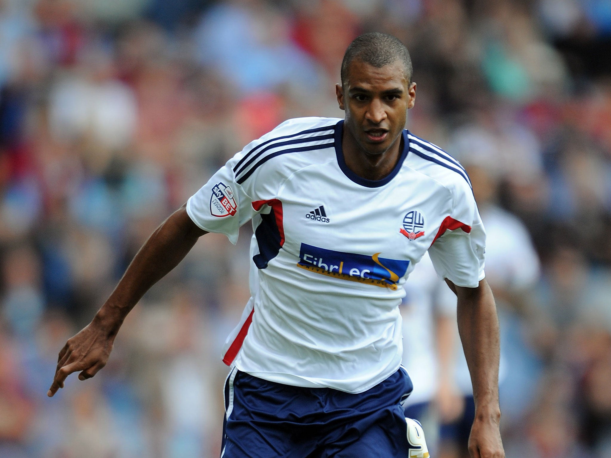 David Ngog is earning £35,000 a week at Bolton but can usually be found on the bench