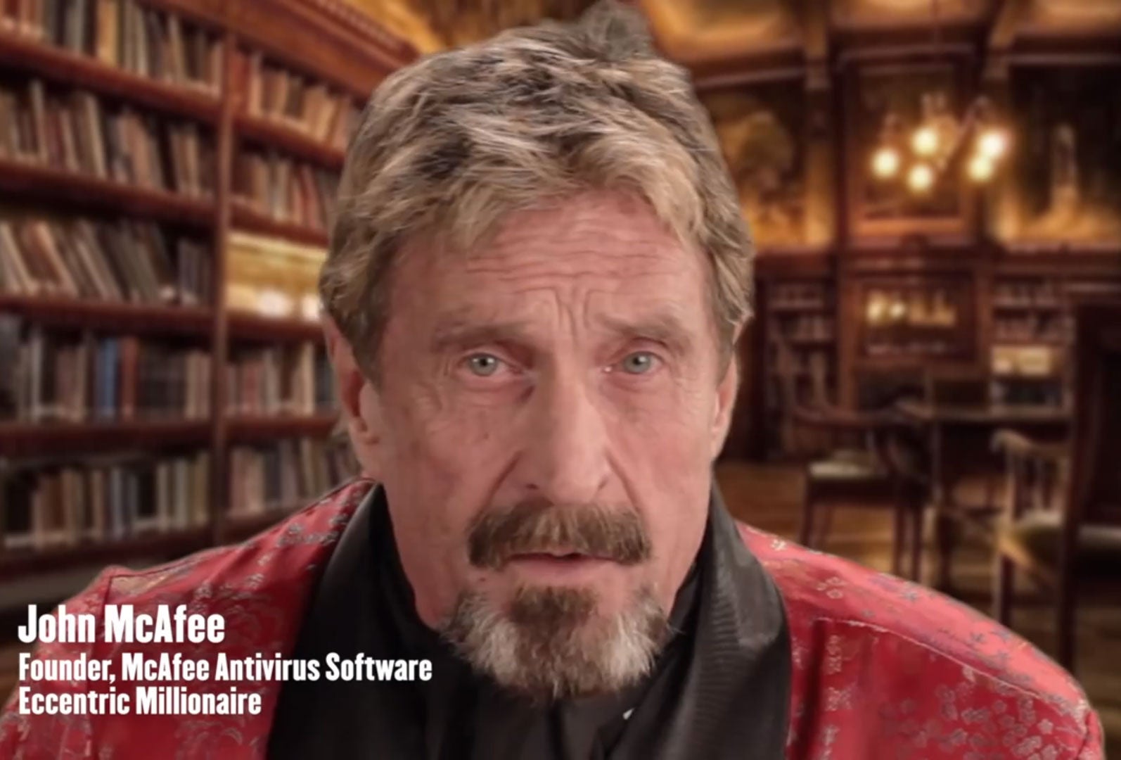 John McAfee as he appears in his video guide to uninstalling his software.
