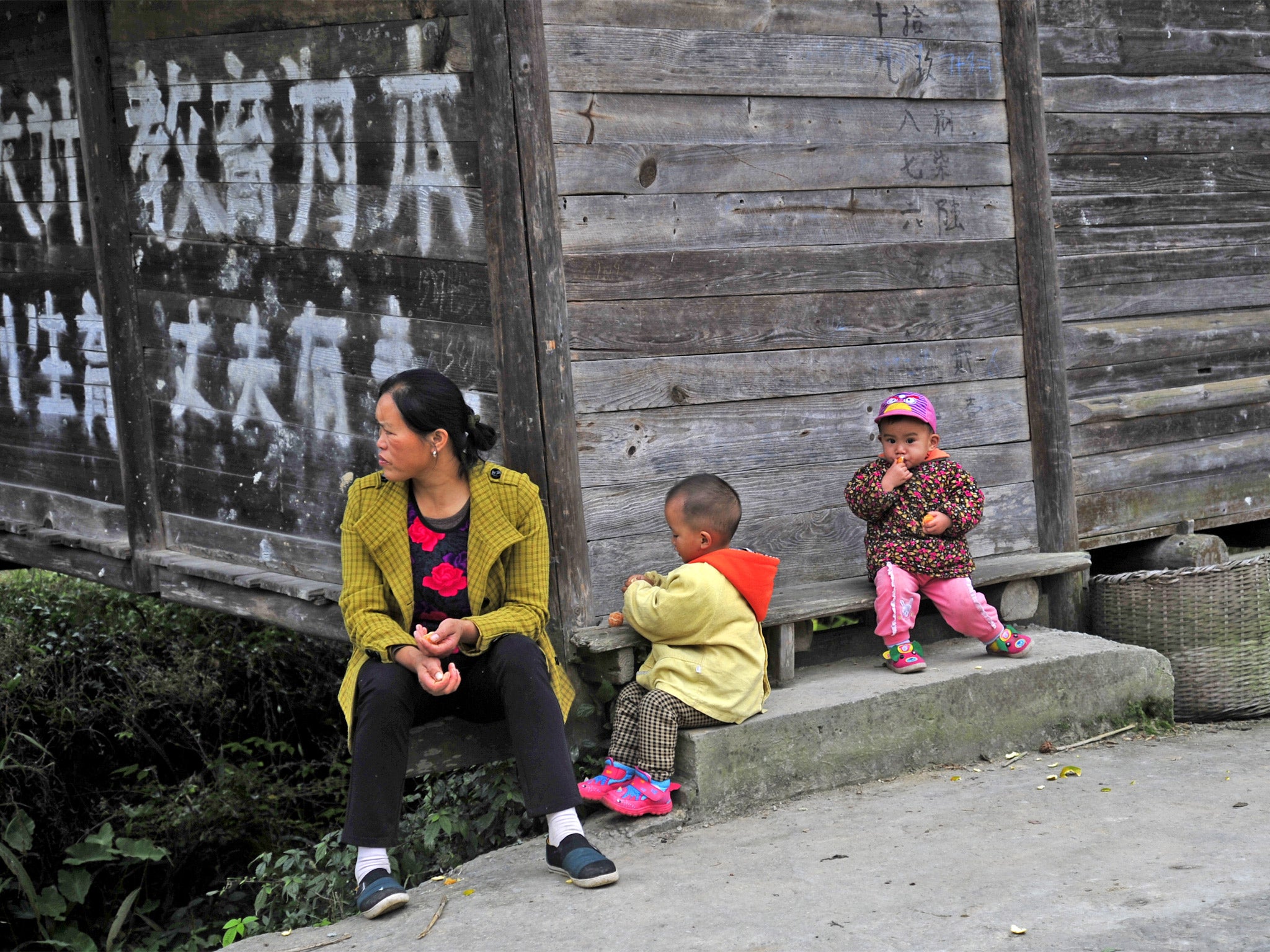 Left behind: about one-fifth of the children in China live in villages without their parents. Most are the offspring of the rural poor