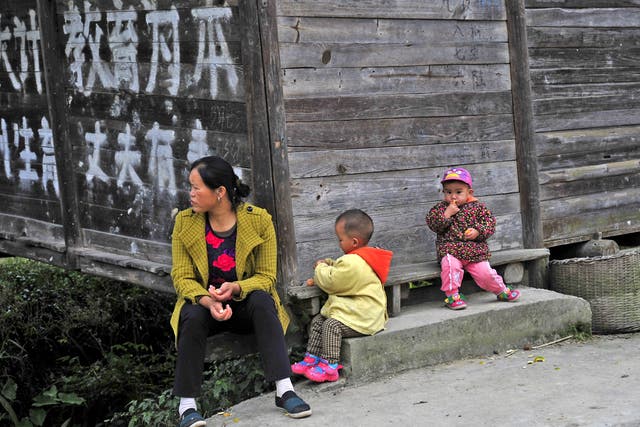 Left behind: about one-fifth of the children in China live in villages without their parents. Most are the offspring of the rural poor