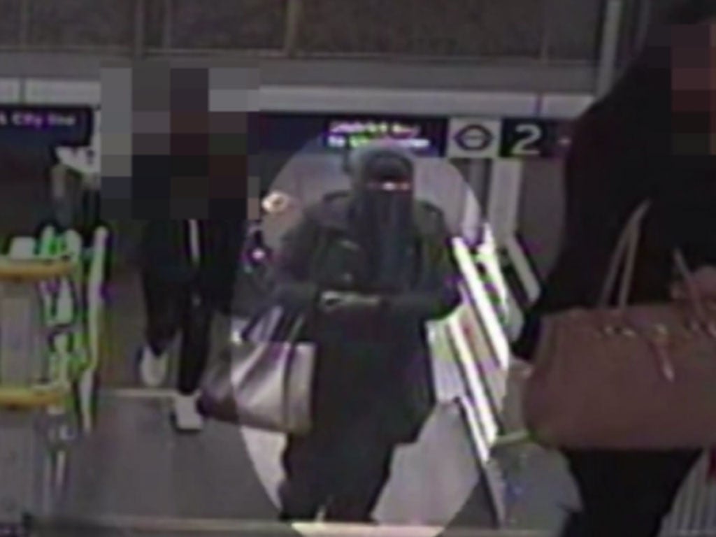 The suspect follows the victim up the stairs in Barking station