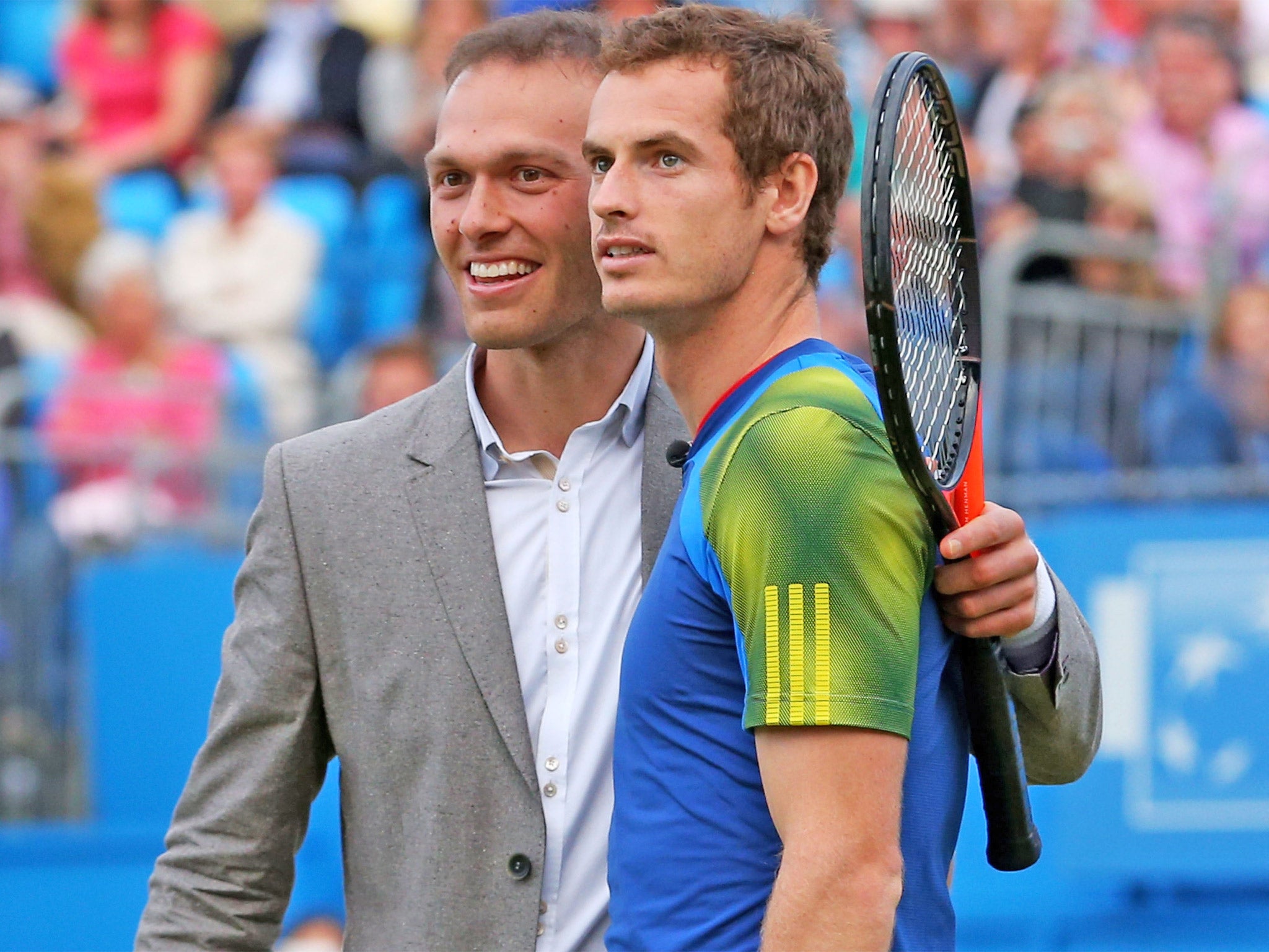Ross Hutchins (left) hugs Andy Murray after a tennis match in aid of a cancer charity