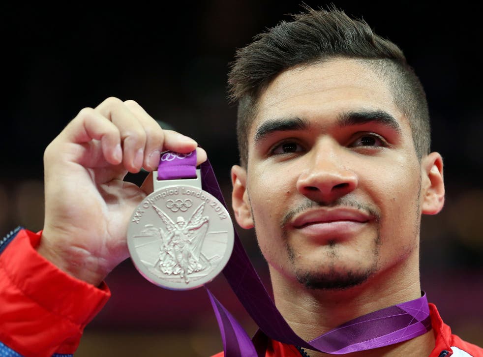 Louis Smith shows off his Olympic silver medal
