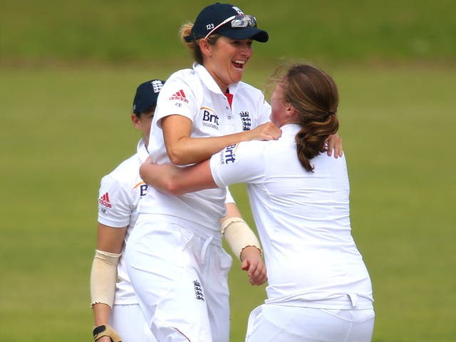 England captain Charlotte Edwards (left) and Anya Shrubsole celebrate the wicket of Australia’s Alyssa Healy