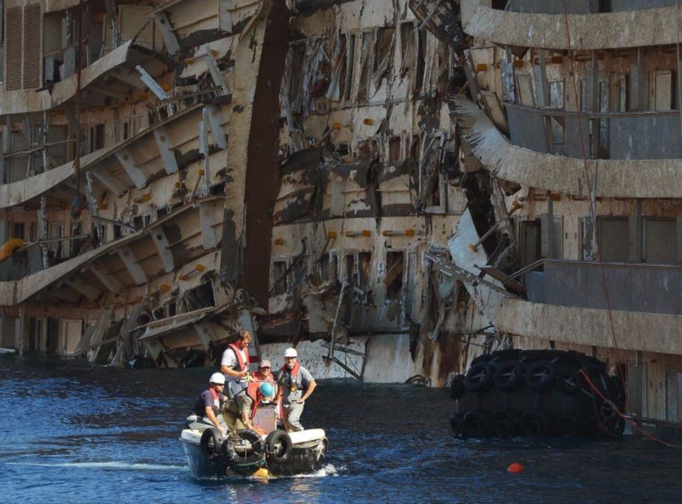 A salvage team works at the wreck of the 'Costa Concordia'
