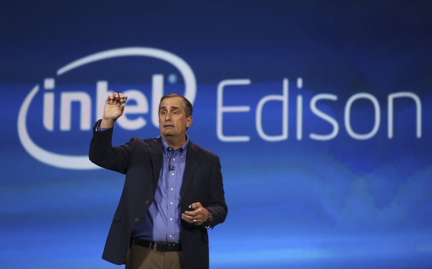 Intel CEO Brian Krzanich introduces Intel's Edison, a new personal computer the size of an SD card, during the annual Consumer Electronics Show (CES) in Las Vegas, Nevada January 6, 2014.