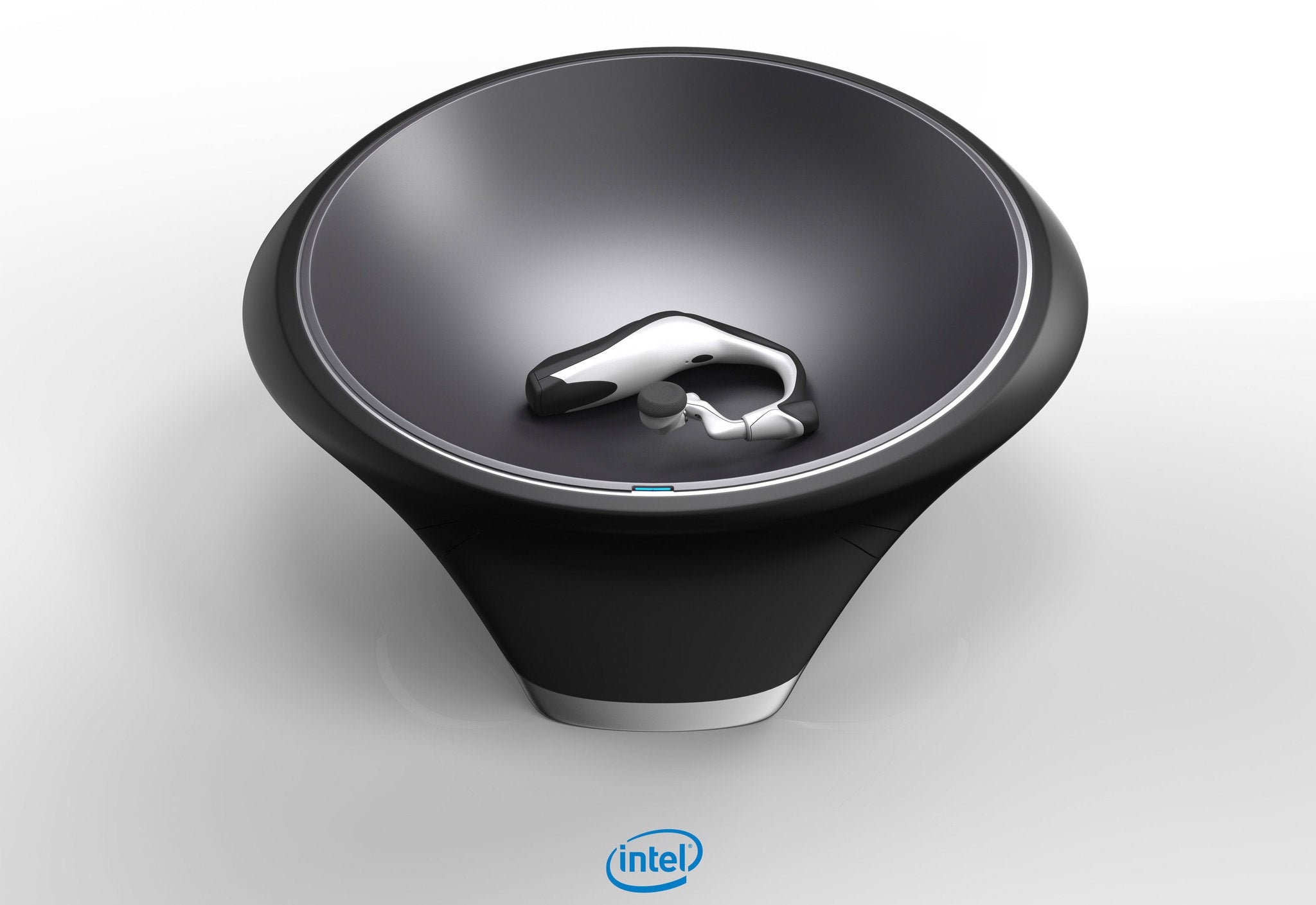 Intel's 'smartbowl' is around 10 inches across and uses magnetic resonance technology to charge multiple devices anywhere in the bowl.