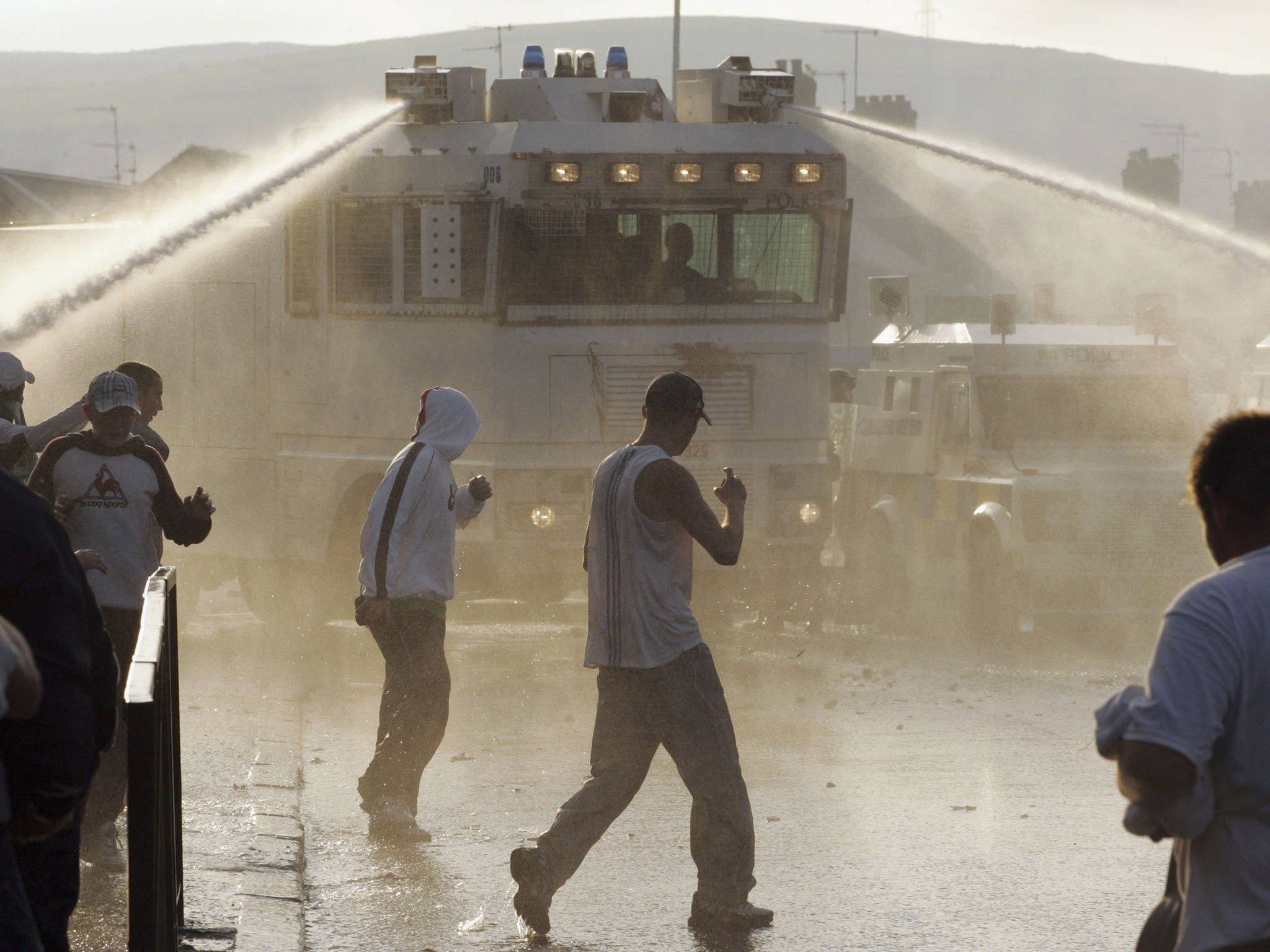 PSNI (Police Service of Northern Ireland) use a water cannon during riots on the Crumlin Road in 2005 in north Belfast