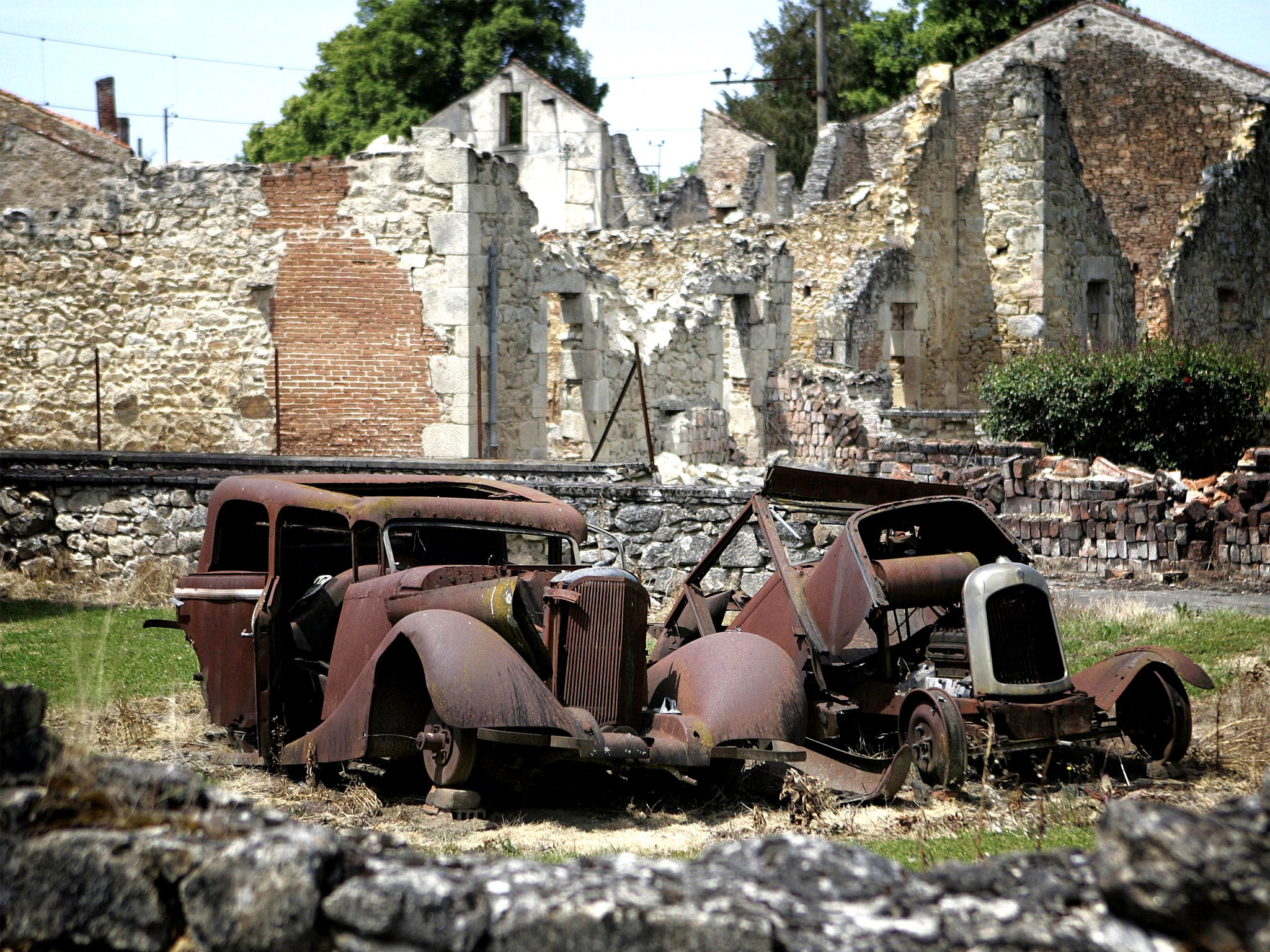Remains of cars at the partially destroyed village of Oradour-sur-Glane, south-western France, where German SS Nazi troops massacred 642 people on June 10, 1944