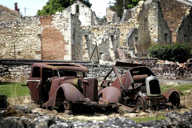 Remains of cars at the partially destroyed village of Oradour-sur-Glane, south-western France, where German SS Nazi troops massacred 642 people on June 10, 1944