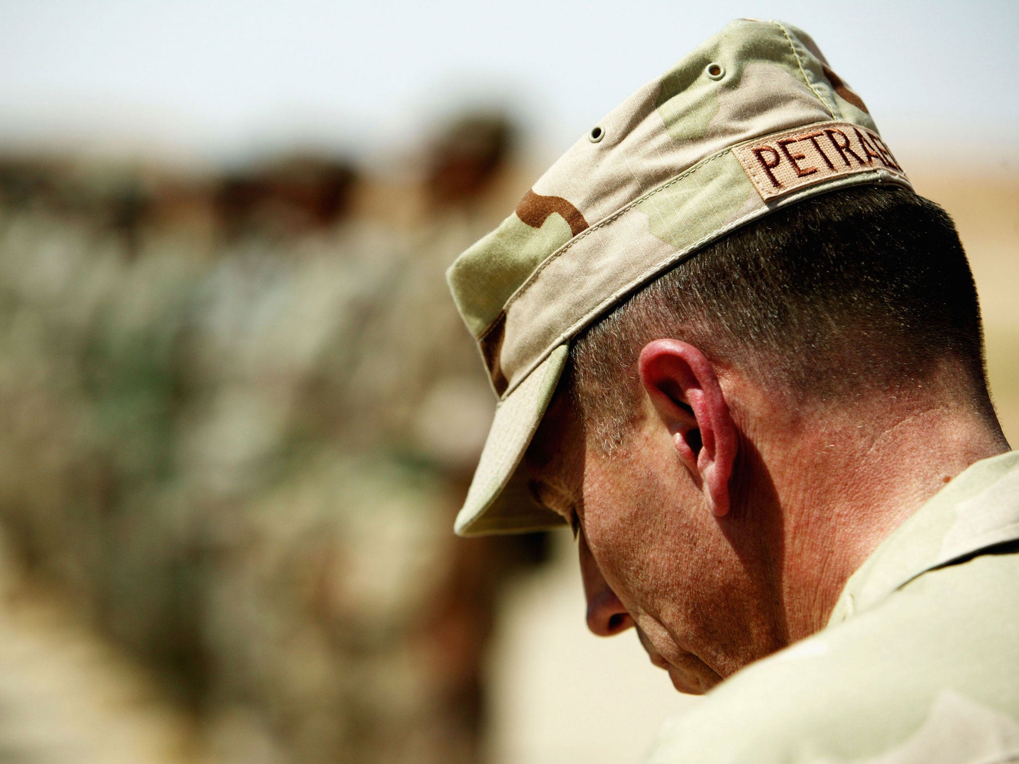 General David Petraeus touring an Iraqi Army training facility in 2004