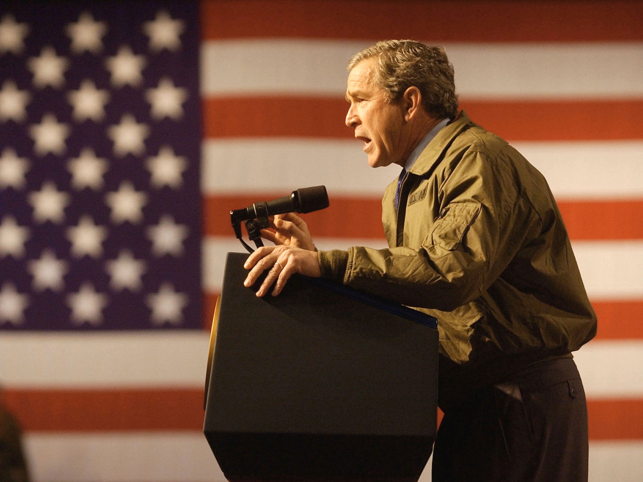 President George W. Bush addressing U.S. troops in January 2003 in Fort Hood, Texas prior to the Iraq invasion