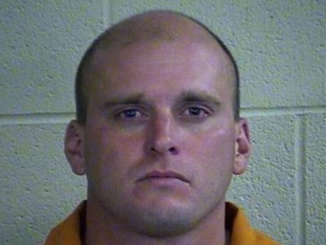 Former marine Brad Lee Davis, 33, who has been charged with murdering his stepfather with his own underwear in an 'atomic wedgie'