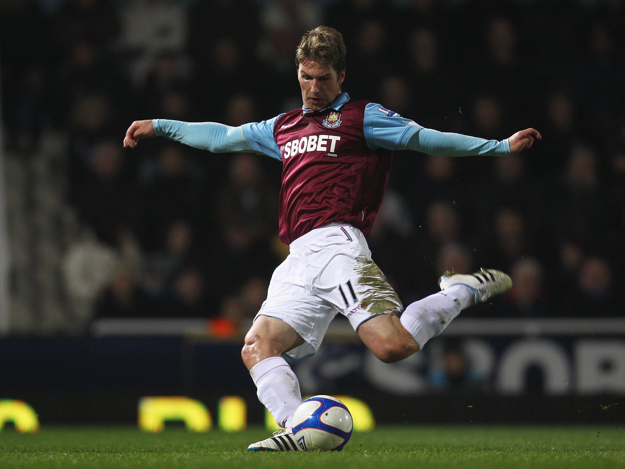 Thomas Hitzlsperger of West Ham United shoots to score the opening goal during the FA Cup in 2011
