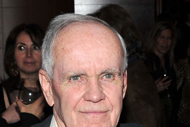 Cormac McCarthy's ex-wife was arrested for threatening her boyfriend with a gun. The author and ms McCarthy divorced in 2006