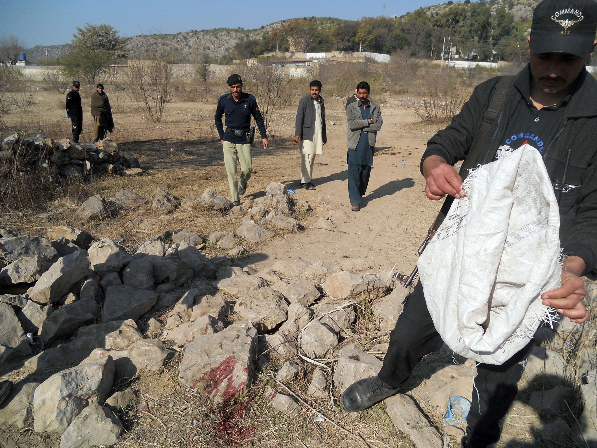 A suicide bomber blew himself up outside a government school in northwest Pakistan, killing Aitzaz Hassan, on Monday