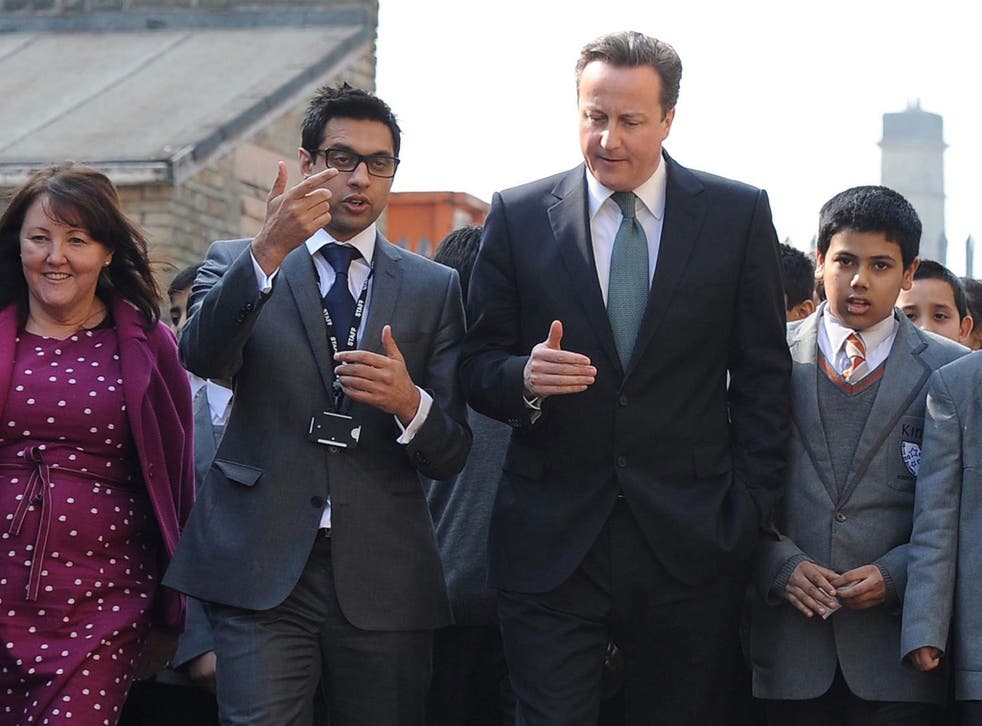 David Cameron with Sajid Raza on a visit to Kings Science Academy 