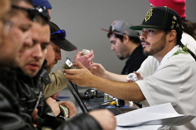 A crowded sales counter at a marijuana retailer in Denver