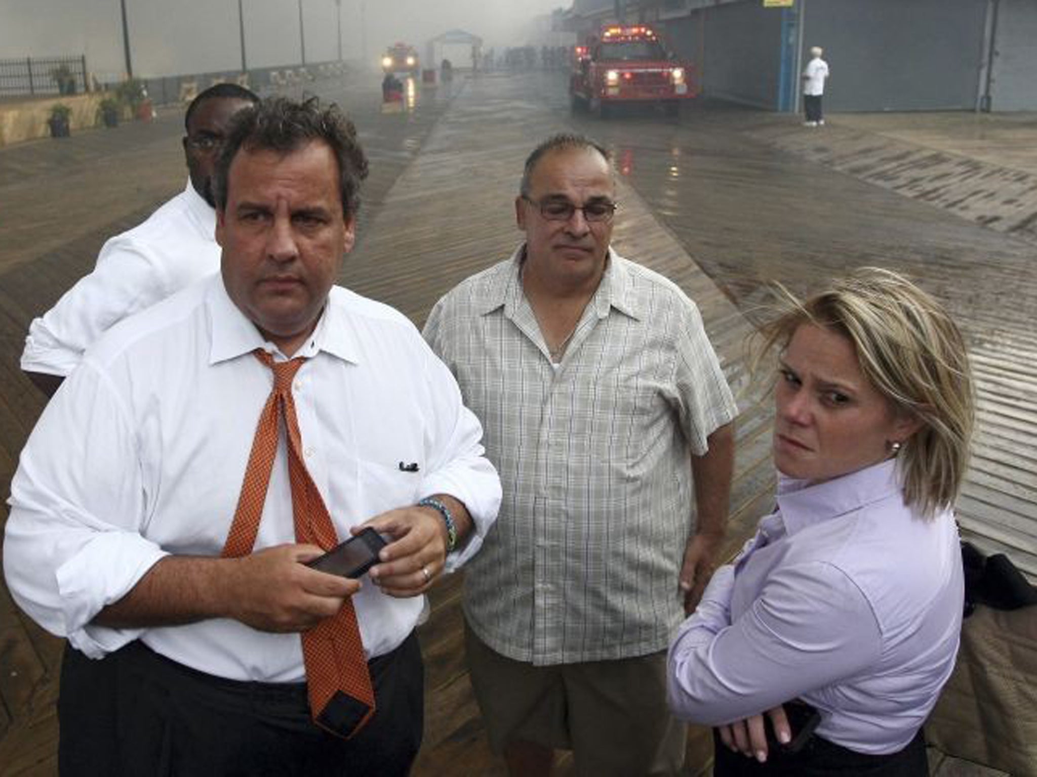 Chris Christie, front left, has dismissed his deputy chief of staff, Bridget Anne Kelly, right