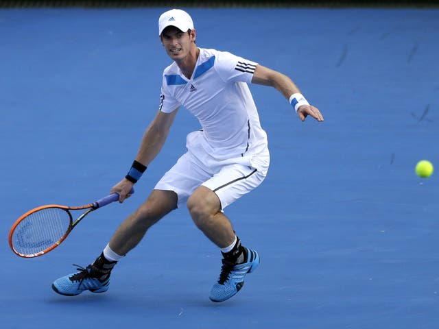 Andy Murray lost to Lleyton Hewitt in an exhibition match yesterday but says his back feels fine
