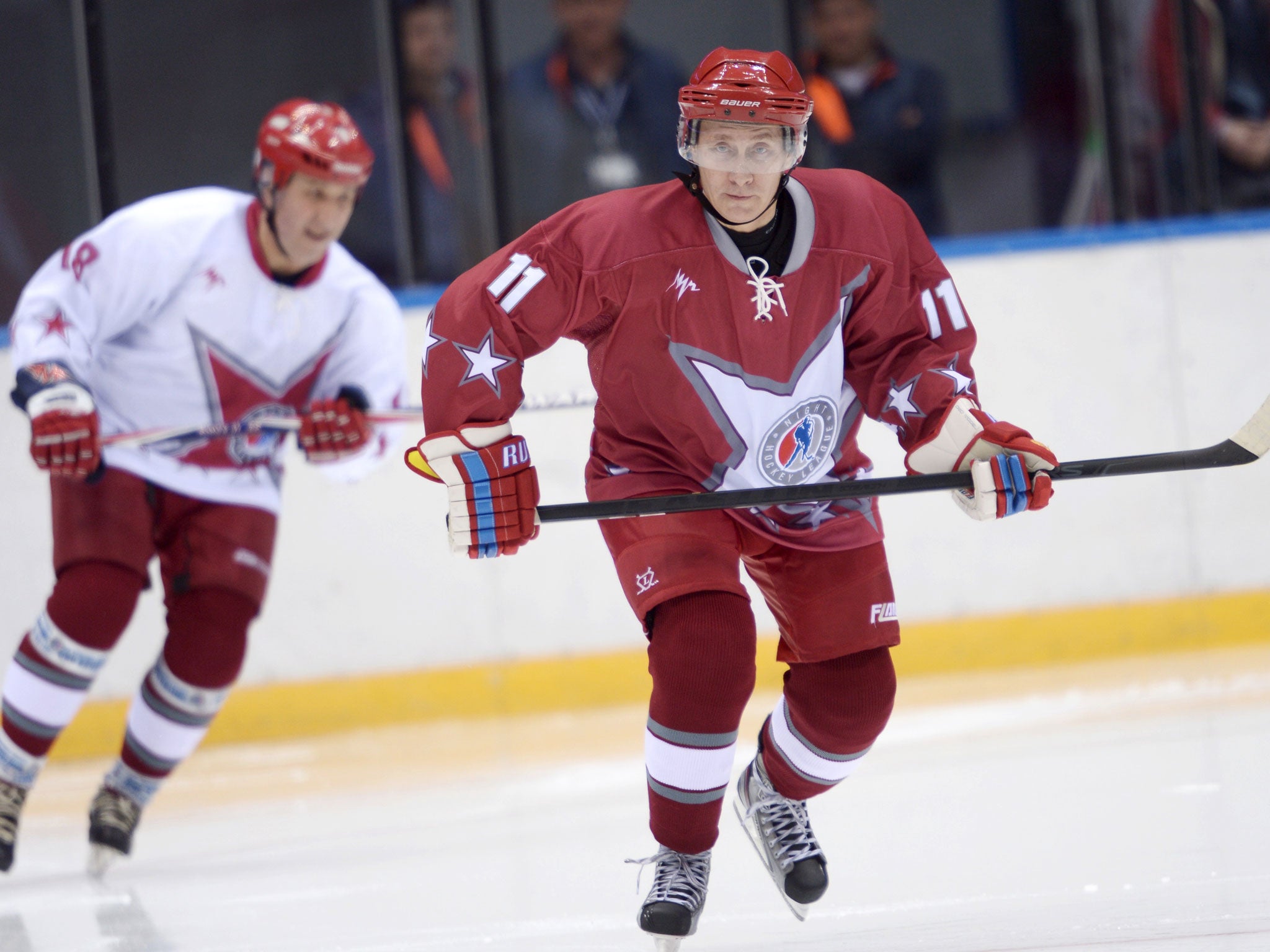 President Vladimir Putin, who has backed the £30bn Games, with the Russia ice hockey team in Sochi