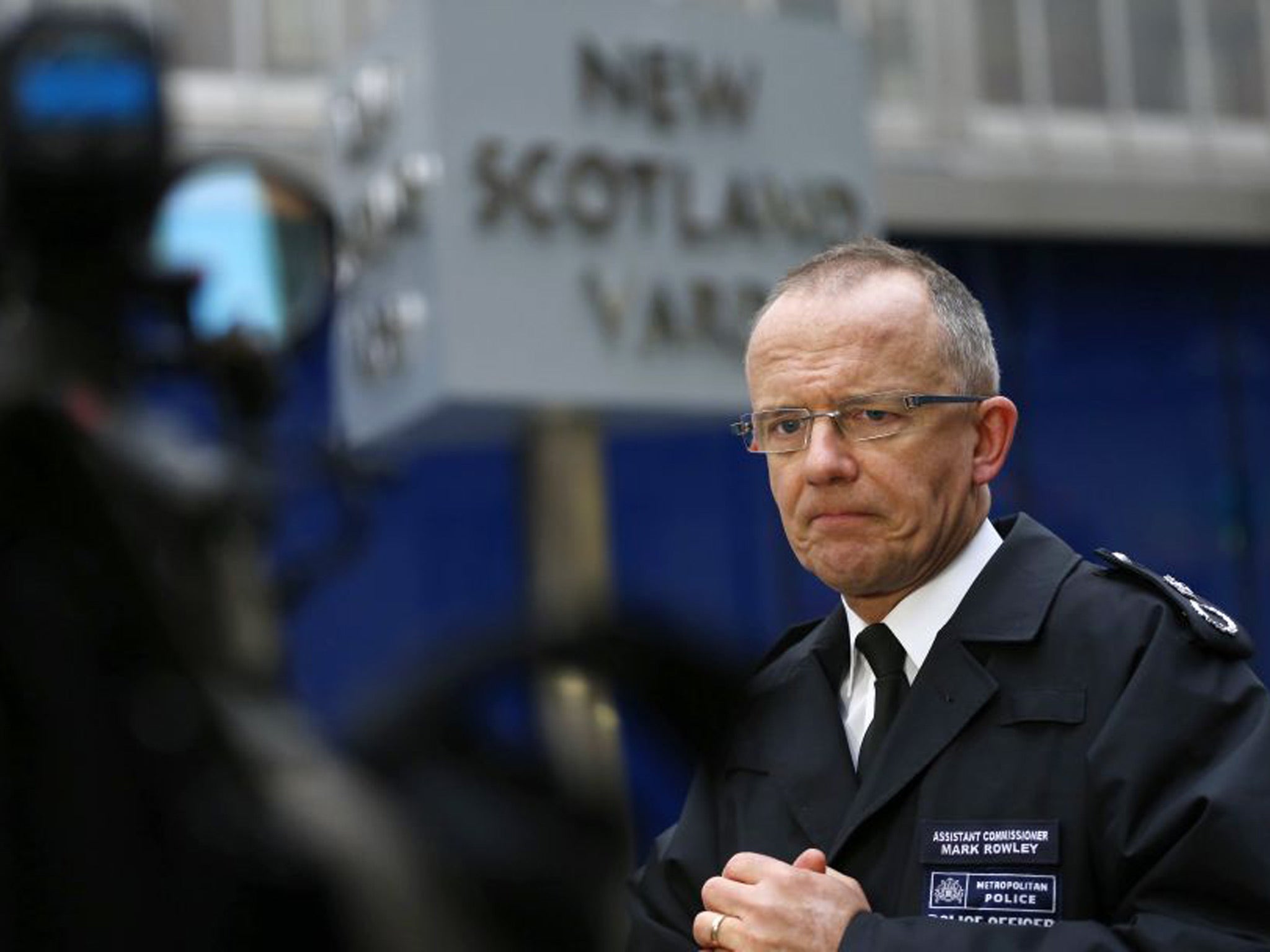 Metropolitan Police Assistant Commissioner Mark Rowley speaks to the media outside New Scotland Yard on Thursday
